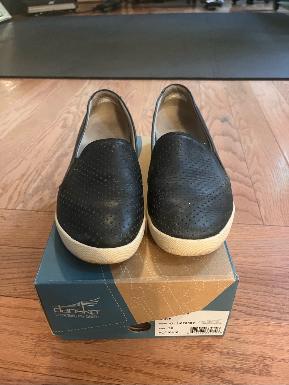 Dansko Black Slip-On Perforated Leather Sneakers with White Soles